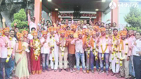 Candidates of the Co-operation Panel cheering after winning the five-year election of the Board of Directors of Nashik District Government and Parishad Bank.