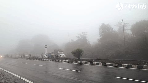 Traffic jammed on the highway due to thick fog with continuous stream