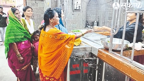 Women devotees offering vaan on Friday as more mass is going on