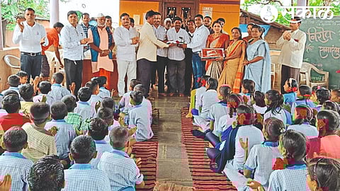 Villagers and teachers bidding farewell to Satish Ingle and Rajesh Bhoye sir