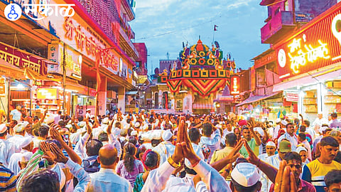 Varkari devotees and Vaishnavas taking darshan of Srimukha in front of Vitthala temple in Bhuvaikunth which is the home of Vaishnavas.