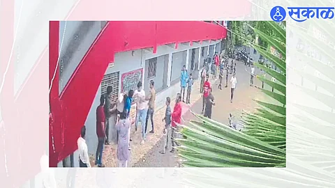 Suspect Kishore Suryavanshi assaulting a teacher in the premises of AGC English Medium School.