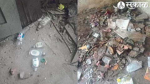 The filth strewn in the school verandah, as well as liquor bottles lying around