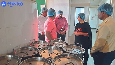 Tribal Development Commissioner Nayana Gunde inspecting the Central Kitchen.
