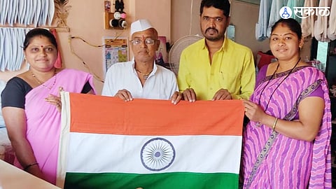 Patriot Shankarao Bhagwat family working to clean and iron flag for free fifty years Independence Day