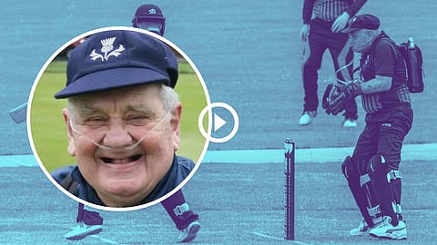 Alex Steele play cricket with oxygen cylinder