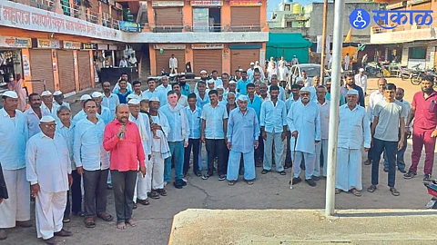 Citizens attending community national anthem in Adarsh village.