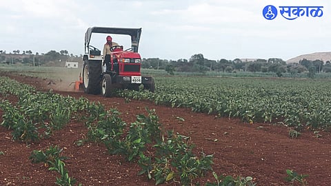 Dagu Katkade while spinning a rotavator on a soybean crop.