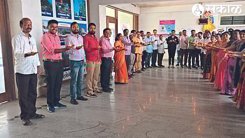 officers and employees taking the Panchprana oath.