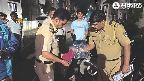 Police personnel inspecting the scene