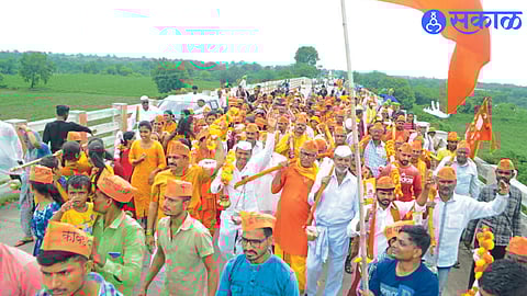Shiva devotees participating in grand Kavad Yatra on the bridge over Tapi river.