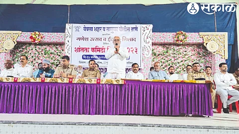 Senior leader Manikrao Shinde speaking at the peace committee meeting held in the background of Ganeshotsav and Eid
