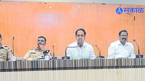 Collector Ayush Prasad speaking at the meeting of Ganapati Mandals on Wednesday.