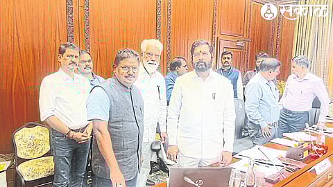 Rajendra Jadhav giving information about the river linking project to Chief Minister Eknath Shinde. Dada Bhuse