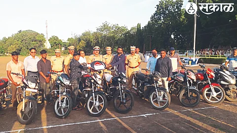 Special Inspector General of Police of Nashik district while returning the two-wheelers seized in various crimes to the complainants. B. G. Shekhar Patil
