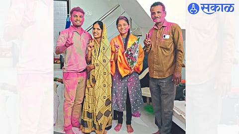 Kiran Prajapat celebrating success with family