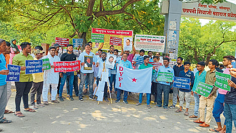 democratic Youth Federation protest against govt decision contracting government posts govt school adoption scheme