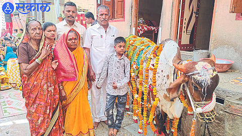 Members of the Sapke family of Laxminagara performing worship of Goddess Lakshmi.