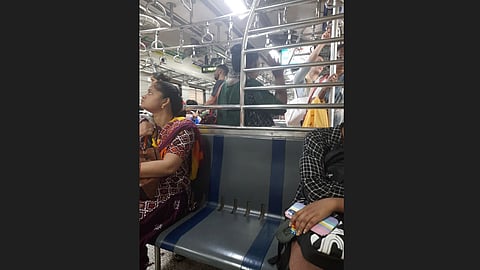 hawkers into the women's compartment