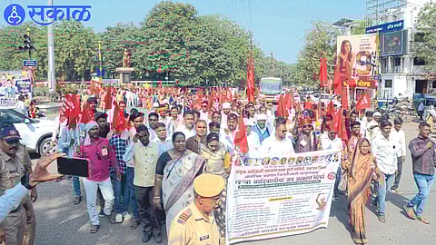 An outcry march was organized by the Joint Tribal Reservation Rights Action Committee at the Collector's Office on Friday.