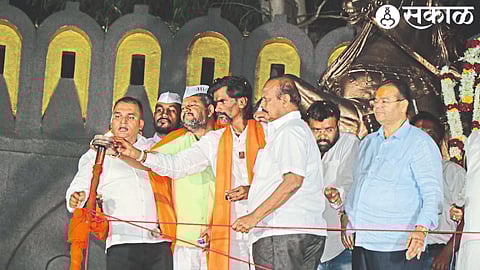 Manoj Jarange-Patil lighting the Maratha Kranti Jyot during a public meeting held on Sunday night at the place of the ongoing chain hunger strike near Shri Chhatrapati Shivaji Maharaj statue on Maratha Samaj reservation issue.