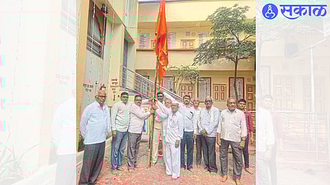 Officials of Dhandai Devi Tarun Aikya Mandal worshiping the Mana Flag near Dhandai Devi Temple on Sunday morning