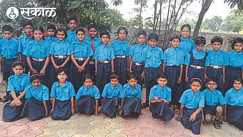 Blue color uniform worn by Zilla Parishad school students