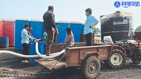 Chandrakant Khode and colleagues filling the water by installing a temporary pump