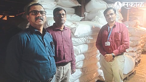 Officials of the Food and Drug Administration along with the seized stock of chilli, coriander powder.