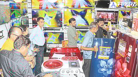 Consumers buying electronics items on the occasion of Lakshmi Puja.