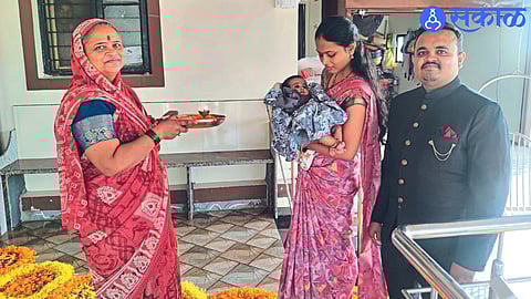 Grandmother while taking care of her granddaughter Soumya.