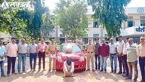 Police officers and teams present with the suspect in custody in the ganja case.