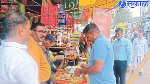 Officers and staff of Crime Investigation Team during action on unauthorized firecracker stalls in Bhadrakali market area.
