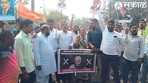 Officials of the Maratha community protesting against the image of minister Chhagan Bhujbal.