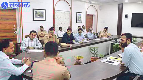Collector Ayush Prasad speaking at a meeting held on Tuesday to review the proposed road works in the city with a fund of 100 crores.