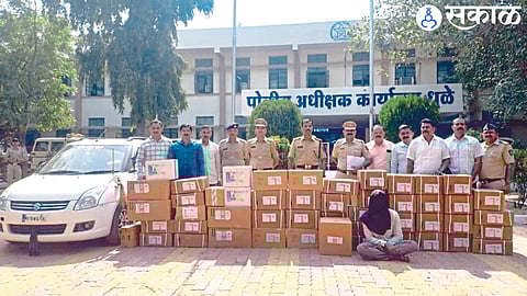 Police officers and teams present with seized goods from the loot.