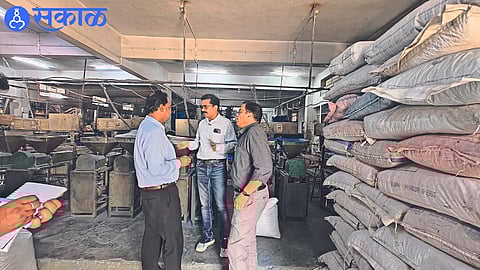 Collector Ayush Prasad during a visit to a plastic company. Jalgaon - Collector Ayush Prasad taking information in a visit to Plastic Company.
