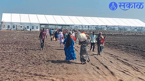 Devotees entering from outside the village.
