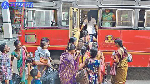 Crowd of women while boarding ST