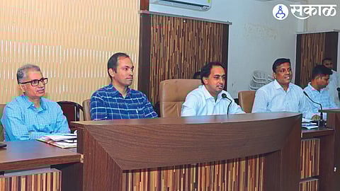 Collector Ayush Prasad speaking at the district annual plan review meeting on Tuesday. Other officers nearby.