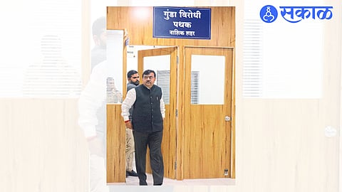 Sudhakar Badgujar coming out after police interrogation.