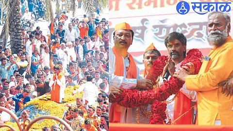 Flowers showered on Manoj Jarange Patil. In the second photograph, Ganesh Pawar, Laxman Shirasath and office bearers are publicly felicitating him by the whole Maratha community.