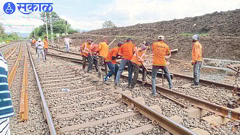 Employees during the extension of the loop line near Mandwa station under the division.