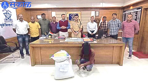 Officers and team present with the items seized by the police.