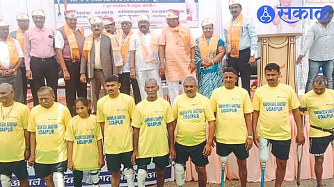 Dignitaries along with beneficiaries in Prosthetic Organ Distribution Program organized by Agarwal Vidyarthi Shiksha Mandal.