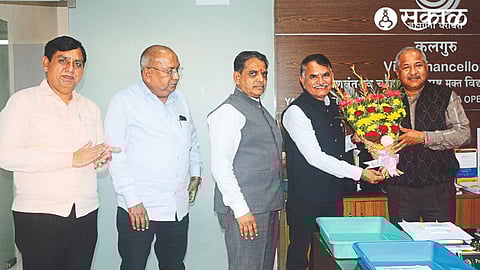 About the appointment of Yashwantrao Chavan as Chancellor of Maharashtra Open University. While felicitating Dilip Bharad, Vice-Chancellor Dr. Sanjeev Sonwane. Officers with