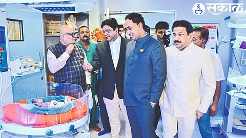 Guardian Minister Gulabrao Patil inspecting the special newborn care room. District Collector Ayush Prasad, CEO Ankit,