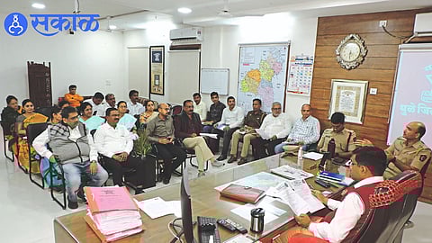 Officials and dignitaries present at the meeting in the Superintendent of Police office regarding marathon.