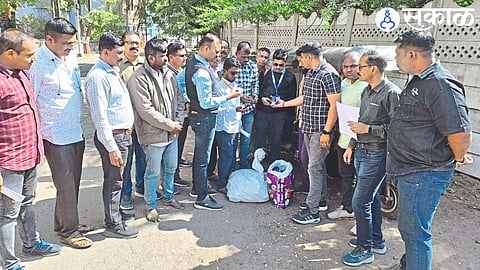 A police team checking the controversial drug stockpile in the Railway Station Road area.