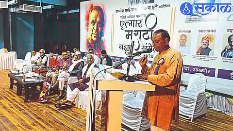 Speaking at the All India Elgar Marathi Ghazal Conference, President Shivaji Gajre and dignitaries present.